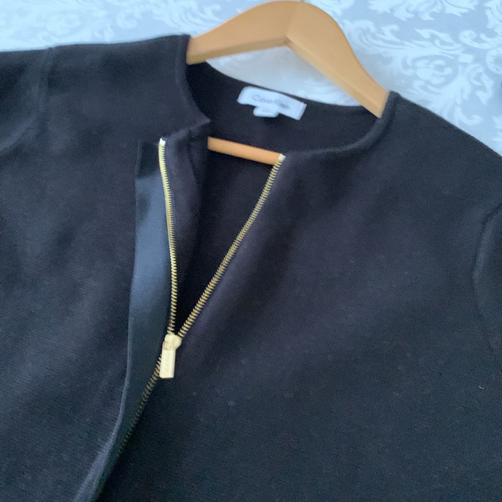Women’s zip front sweater.